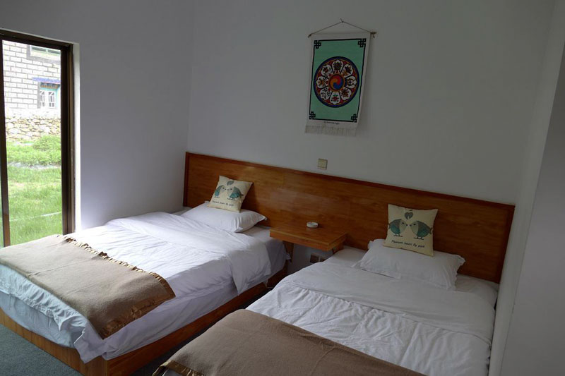 Une des chambres à coucher pour touristes aménagées par la famille de villageois (photo : Elena Ettinger, juin 2019) Une des chambres à coucher pour touristes aménagées par la famille de villageois (photo : Elena Ettinger, juin 2019)
