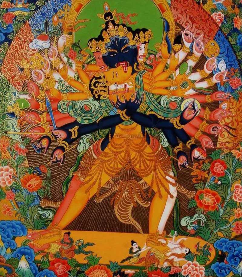 Plusieurs visages de Kalachakra lié à sa parèdre, armes aux poings et écrasant les ennemis de la bonne doctrine Plusieurs visages de Kalachakra lié à sa parèdre, armes aux poings et écrasant les ennemis de la bonne doctrine